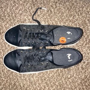 Black and white Michael Kors Shoes size 9.5
